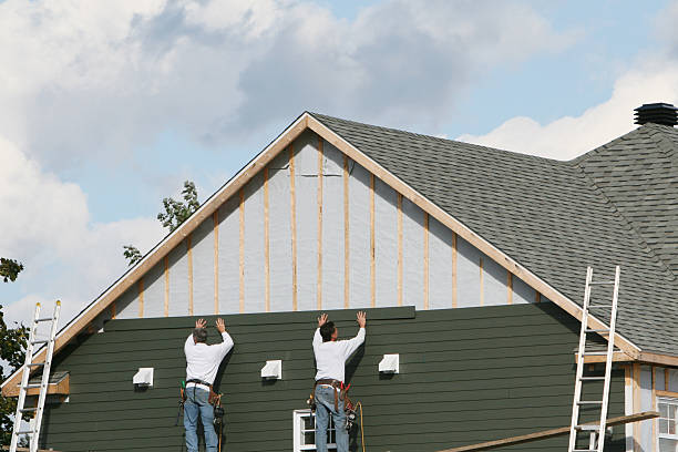 Professional Storm Damage Siding Repair technician working in Lothian, MD